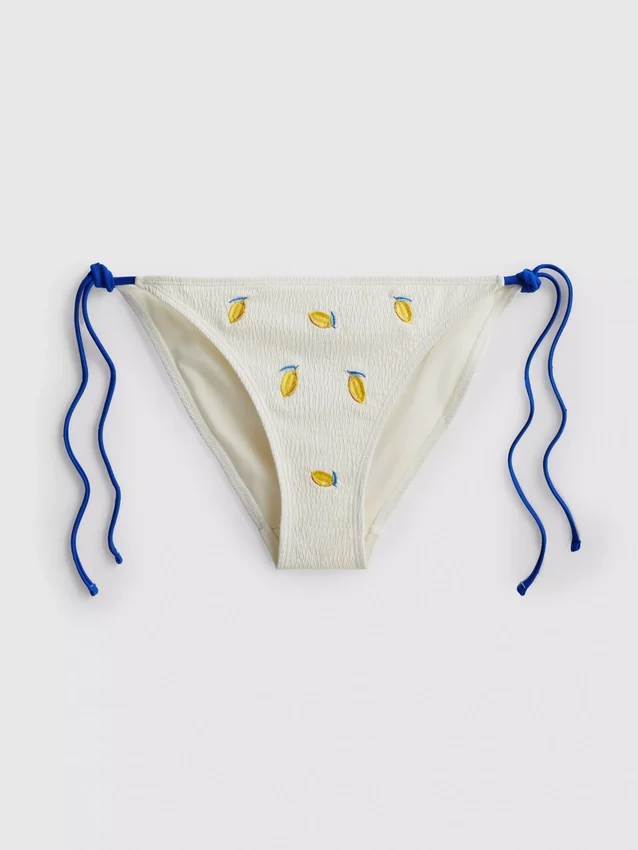 Bikini con braguita texturizada color limón y atado a los lados
