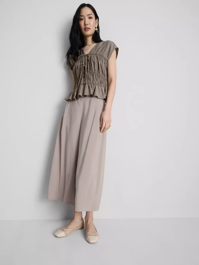 Blusa arrugada con lazo al frente