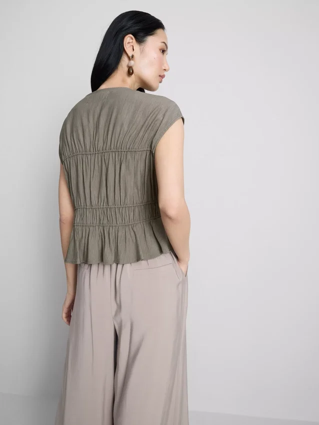 Blusa arrugada con lazo al frente