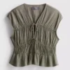 Blusa arrugada con lazo al frente
