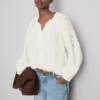 Blusa bordada con mangas abullonadas
