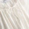 Blusa bordada con mangas abullonadas