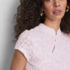 Blusa con cuello alto texturizado