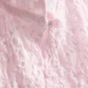 Blusa con cuello alto texturizado