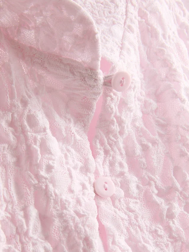 Blusa con cuello alto texturizado