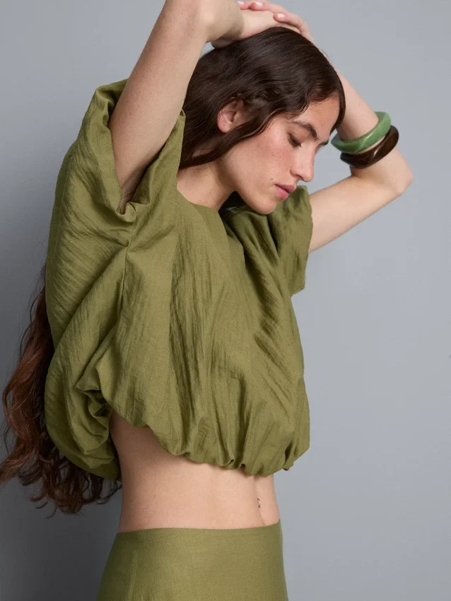 Blusa con dobladillo abombado