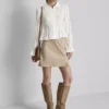 Blusa con dobladillo fruncido tipo peplum