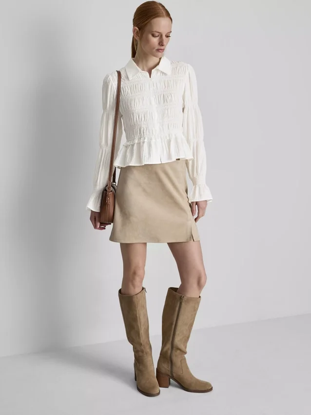 Blusa con dobladillo fruncido tipo peplum