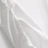 Blusa con hombros descubiertos y fruncidos de Paula Echevarría