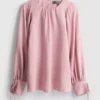 Blusa con mangas abullonadas texturizadas