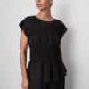 Blusa con volantes