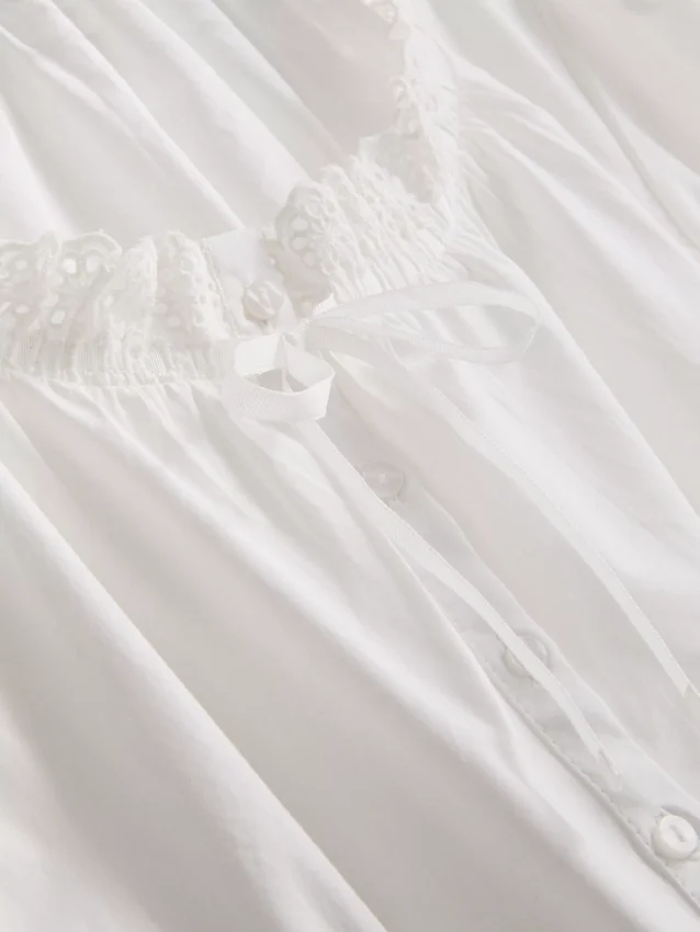 Blusa corta de popelín de algodón con mangas abullonadas