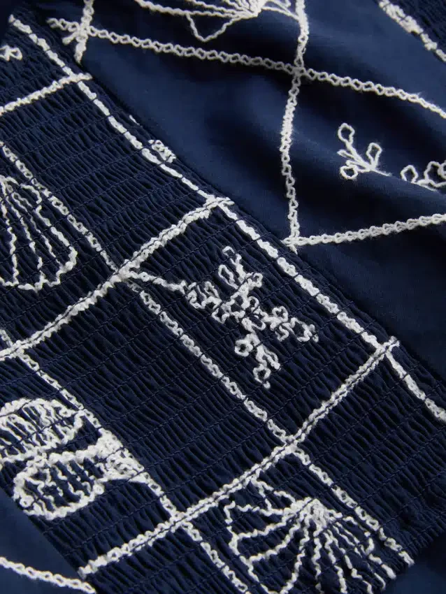 Blusa de algodón con cuello halter y calado