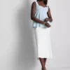 Blusa de crepé con peplum y escote corazón