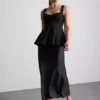 Blusa de crepé con peplum y escote corazón