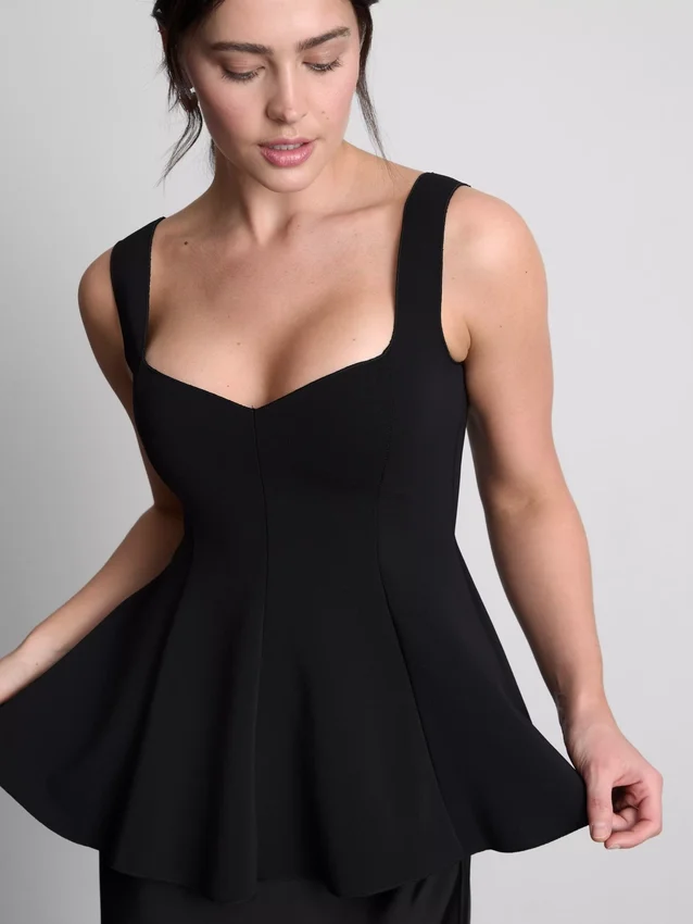 Blusa de crepé con peplum y escote corazón