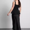 Blusa de crepé con peplum y escote corazón