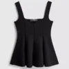 Blusa de crepé con peplum y escote corazón