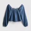 Blusa de mezclilla con mangas abullonadas de Paula Echevarría