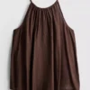 Blusa trapecio con cuello halter texturizada