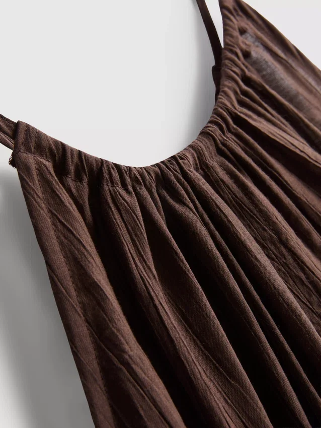 Blusa trapecio con cuello halter texturizada
