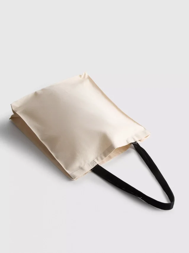 Bolsa de lona con eslogan de «El diablo viste de Prada»