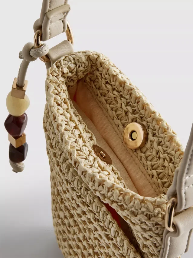 Bolsa para celular tejida con cuentas