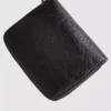 Bolso con cremallera de aspecto desgastado