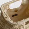 Bolso cruzado tejido de Paula Echevarría