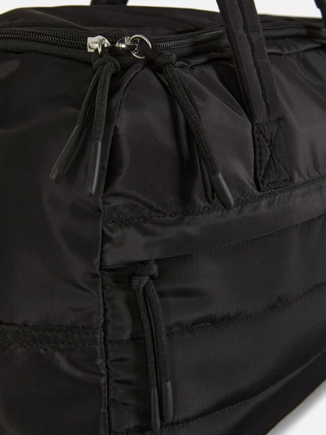 Bolso de cabina acolchado para debajo del asiento