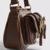 Bolso de hombro con bolsillo con hebilla