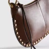 Bolso de hombro con tachuelas de imitación de cuero de Paula Echevarría