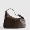 Bolso de hombro holgado con detalle de anillos