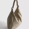 Bolso de hombro holgado con detalle de anillos