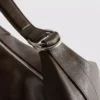 Bolso de hombro holgado con detalle de anillos