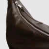 Bolso de hombro holgado con detalle de anillos