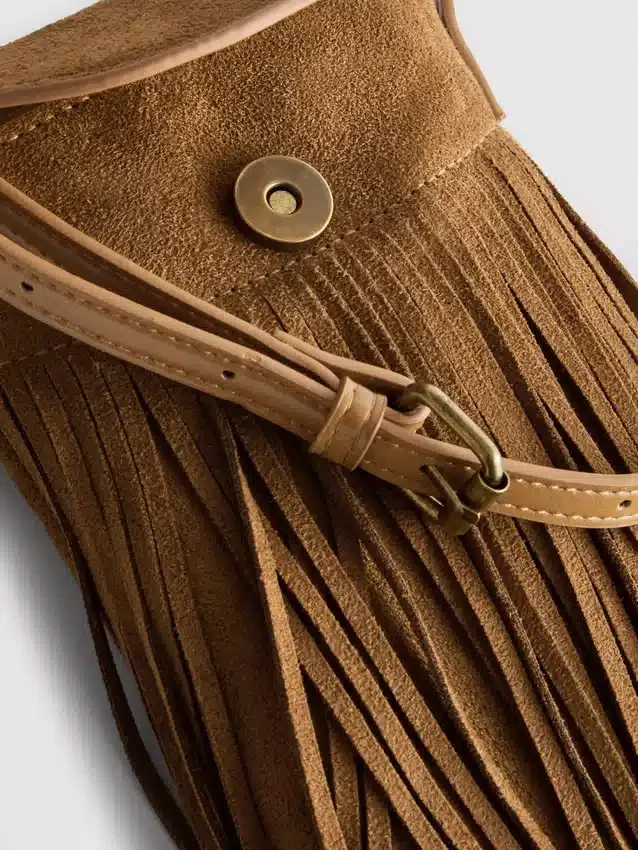 Bolso porta celular con flecos