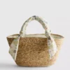 Bolso tipo cubo midi de paja tejida