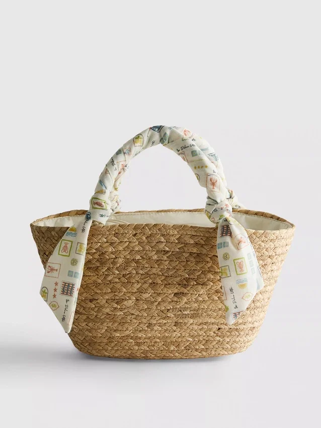 Bolso tipo cubo midi de paja tejida
