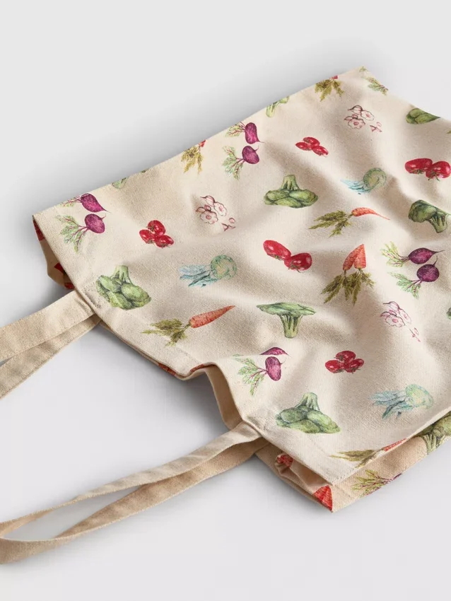 Bolso tipo tote con estampado vegetal