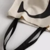 Bolso tipo tote con iniciales