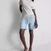 Camisa de algodón asimétrica con flecos