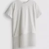 Camisa de algodón asimétrica con flecos