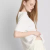 Camisa de algodón con forma de croissant, con motivos de volantes y corazones rotos
