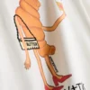 Camisa de algodón con forma de croissant, con motivos de volantes y corazones rotos