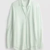 Camisa holgada con botones y dobladillo curvo