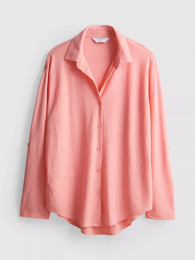 Camisa holgada con botones y dobladillo curvo