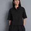 Camisa holgada de manga corta de algodón de primera calidad