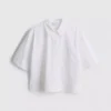 Camisa holgada de manga corta de algodón de primera calidad
