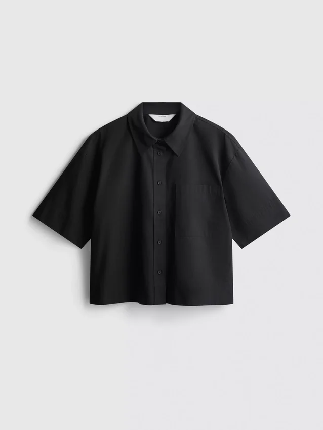 Camisa holgada de manga corta de algodón de primera calidad